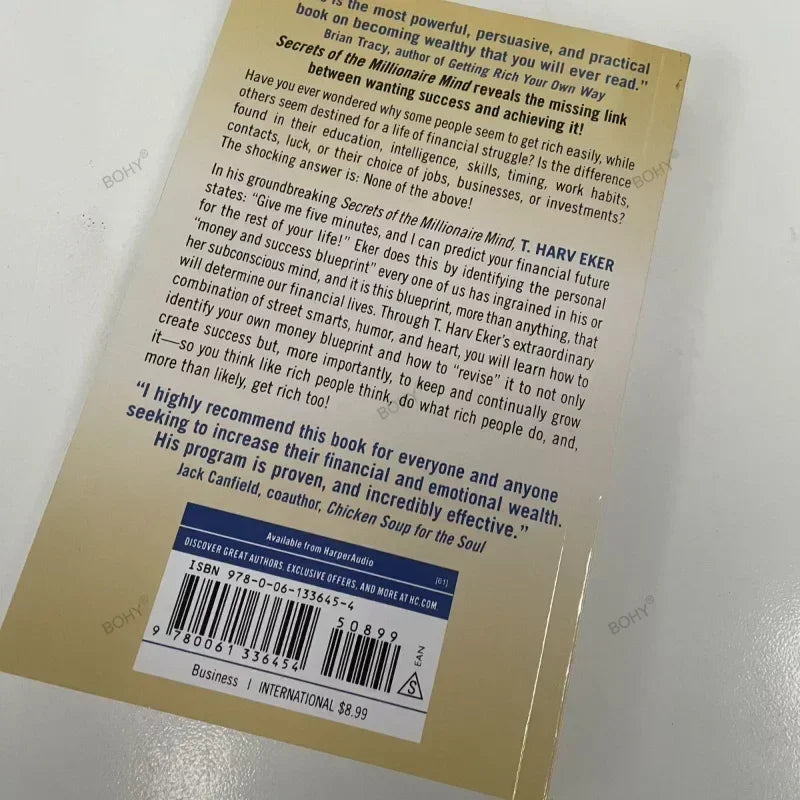 "Secrets of the Millionaire Mind: Mastering Wealth by T. Harv Eker."English Paperback